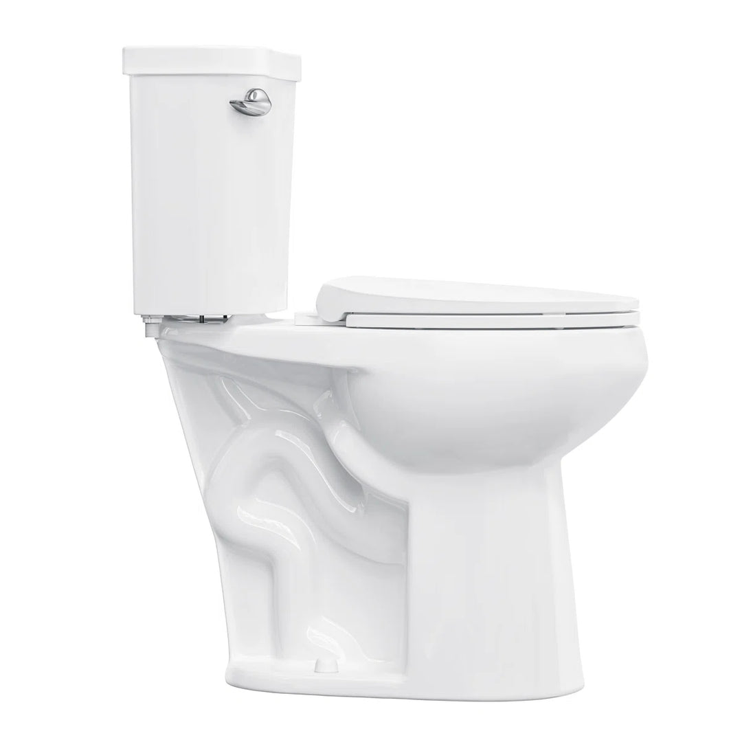 Side view of white two-piece elongated toilet with chrome flush lever.