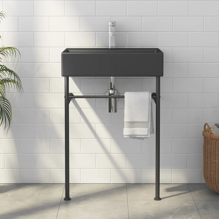 Matte black rectangular console sink with metal stand