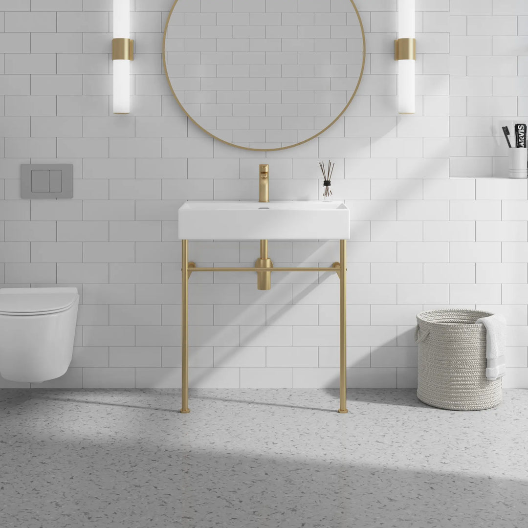 Eridanus white console sink with brass gold stand and faucet.