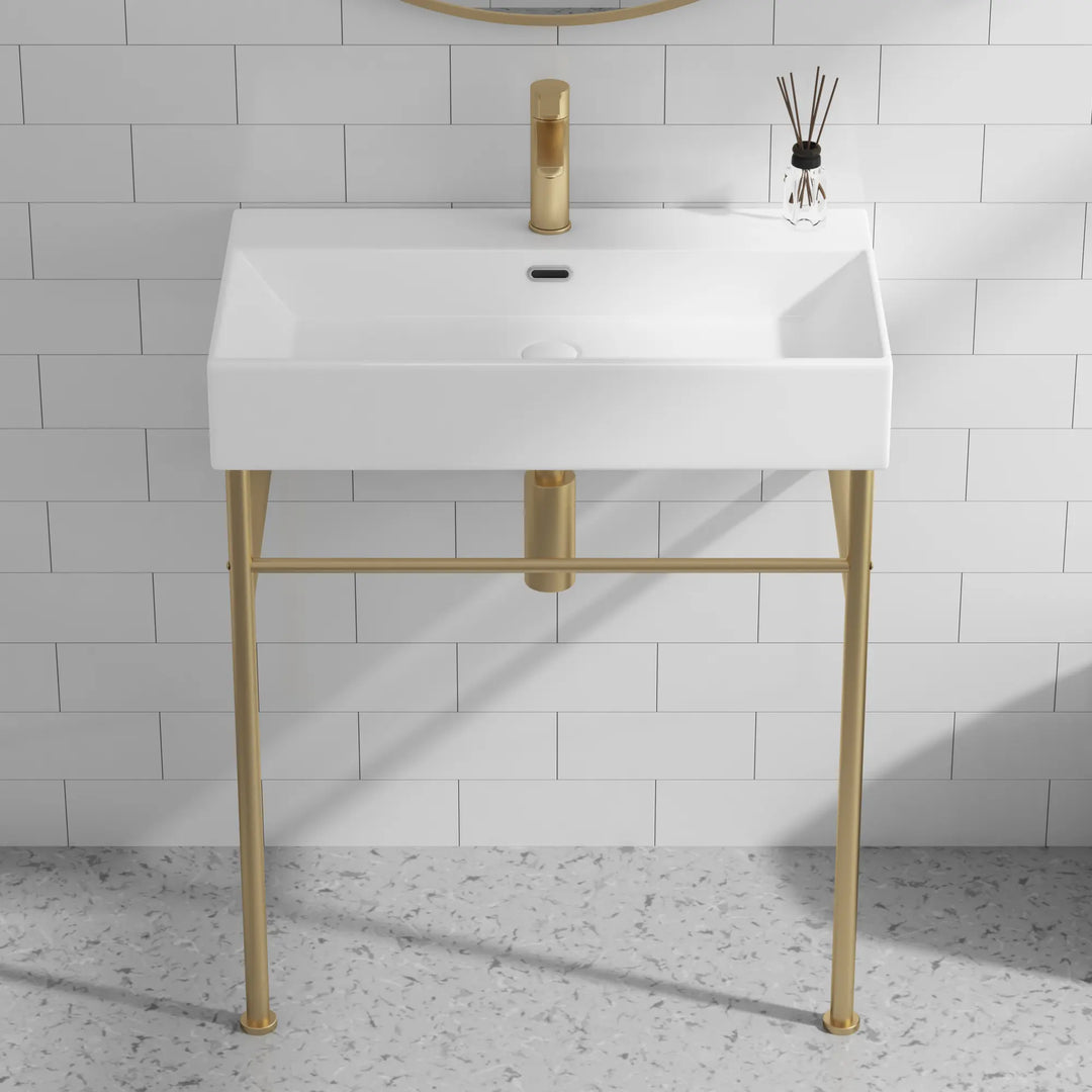 Eridanus white console sink with brass gold stand and faucet.