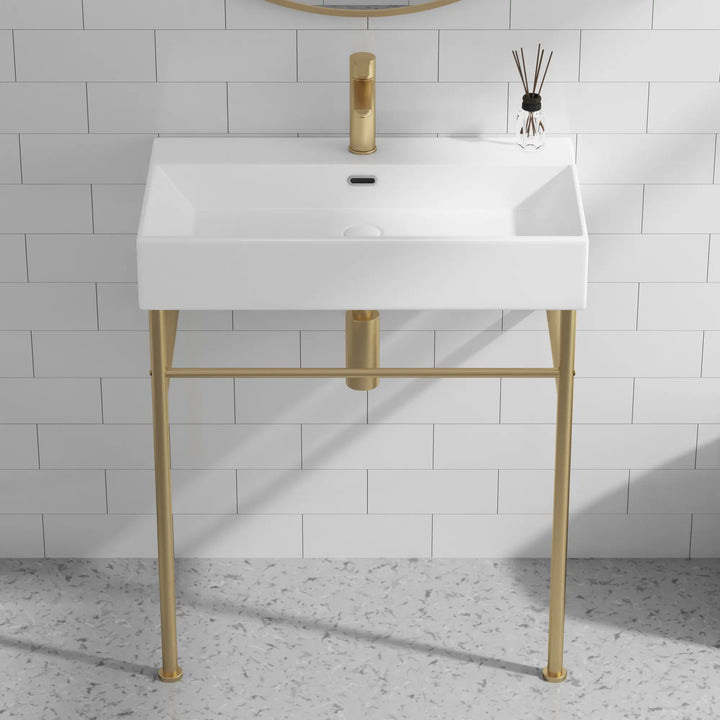 Eridanus white console sink with brass gold stand and faucet.