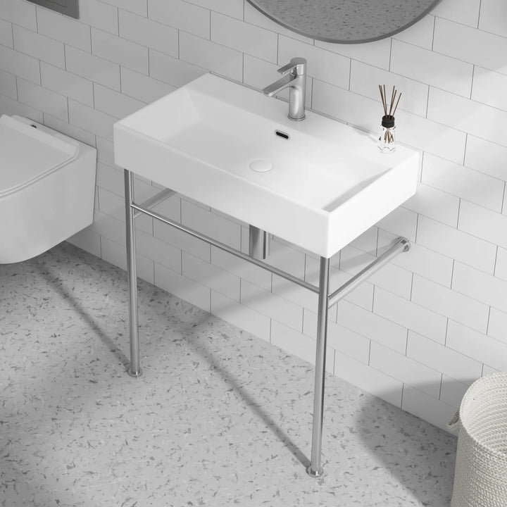 White ceramic rectangular console sink with chrome stand