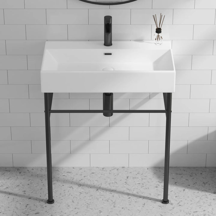 ERIDANUS white ceramic console sink with black legs and towel bar.