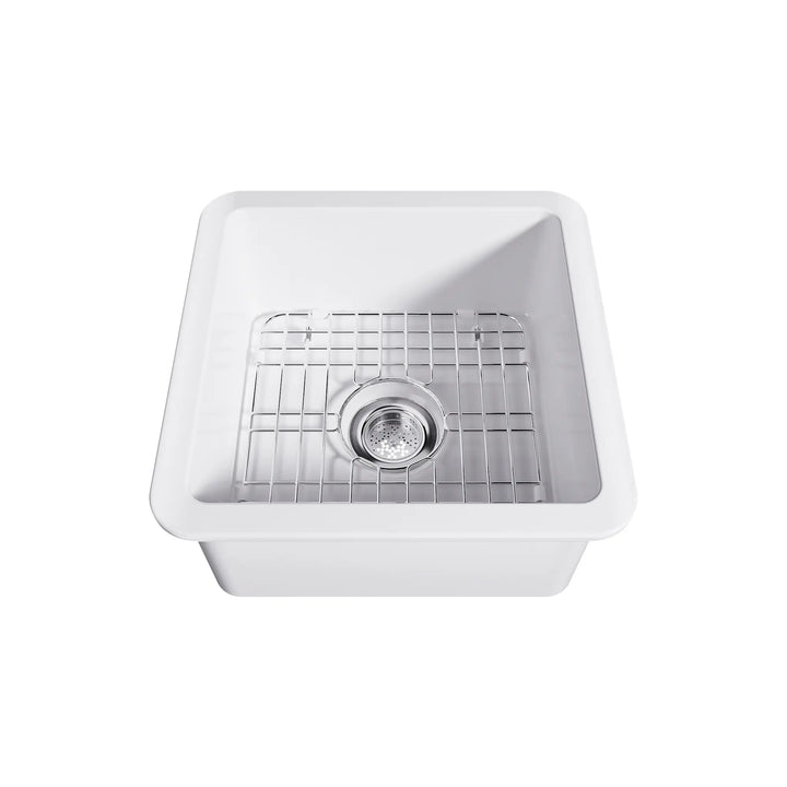 White square fireclay sink with bottom grid and drain