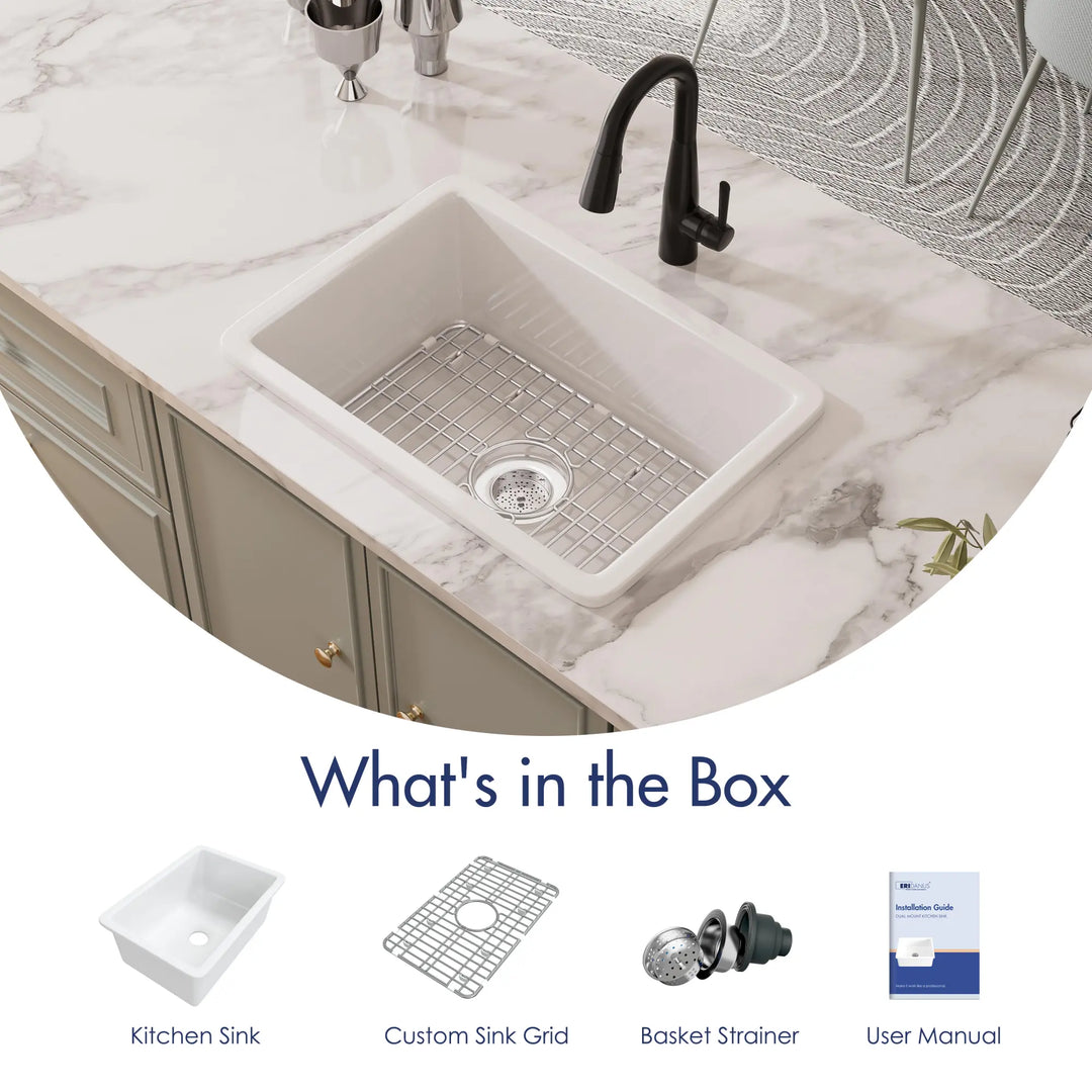 White fireclay kitchen sink with grid, strainer, and manual accessories