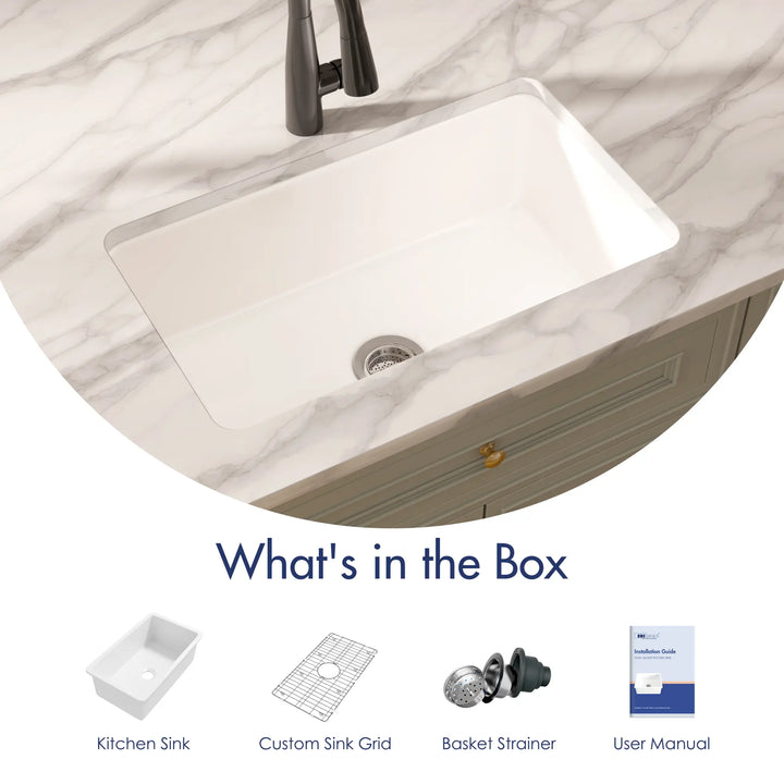 White rectangular fireclay kitchen sink with included grid, basket strainer, and manual