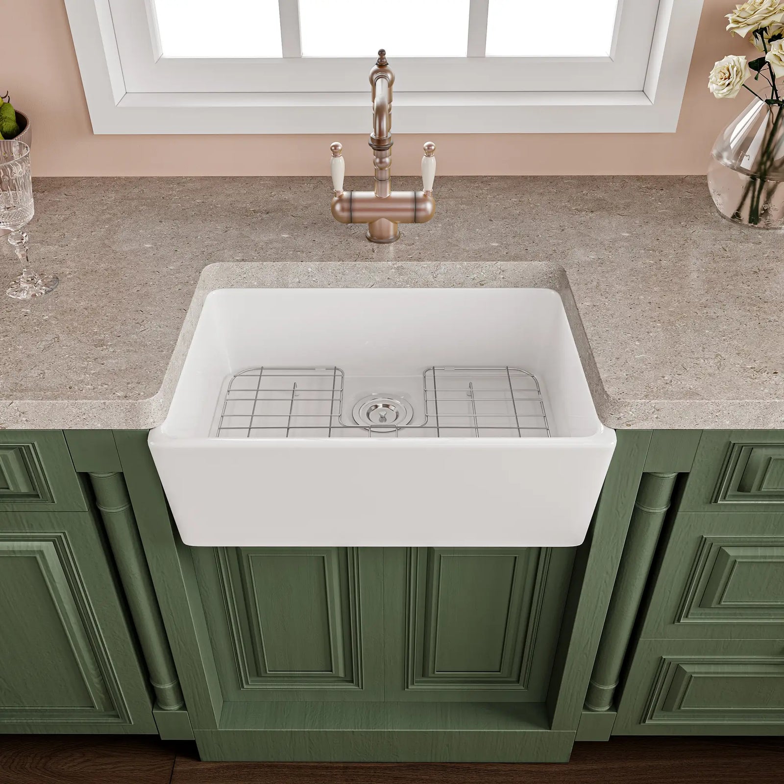 White fireclay farmhouse kitchen sink with apron front and grid