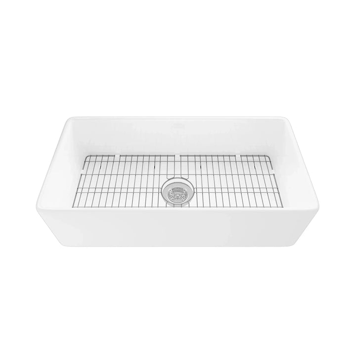 White fireclay single bowl apron front kitchen sink with stainless steel bottom grid