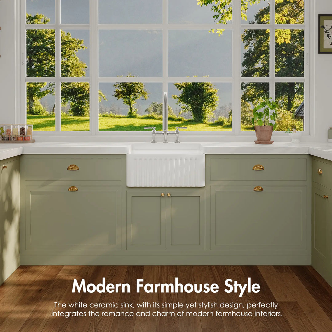 White ceramic farmhouse sink with fluted apron front in modern farmhouse style