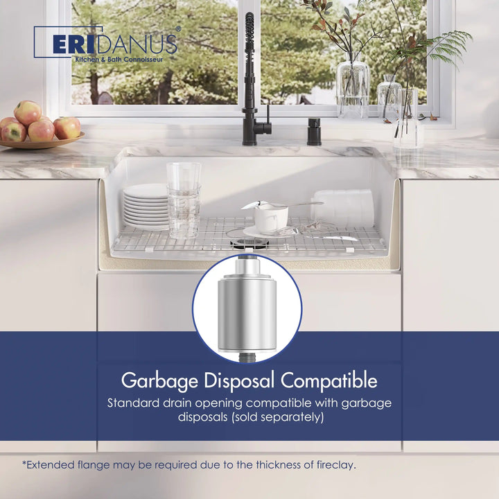 White fireclay farmhouse sink compatible with garbage disposal, equipped with stainless steel bottom grid