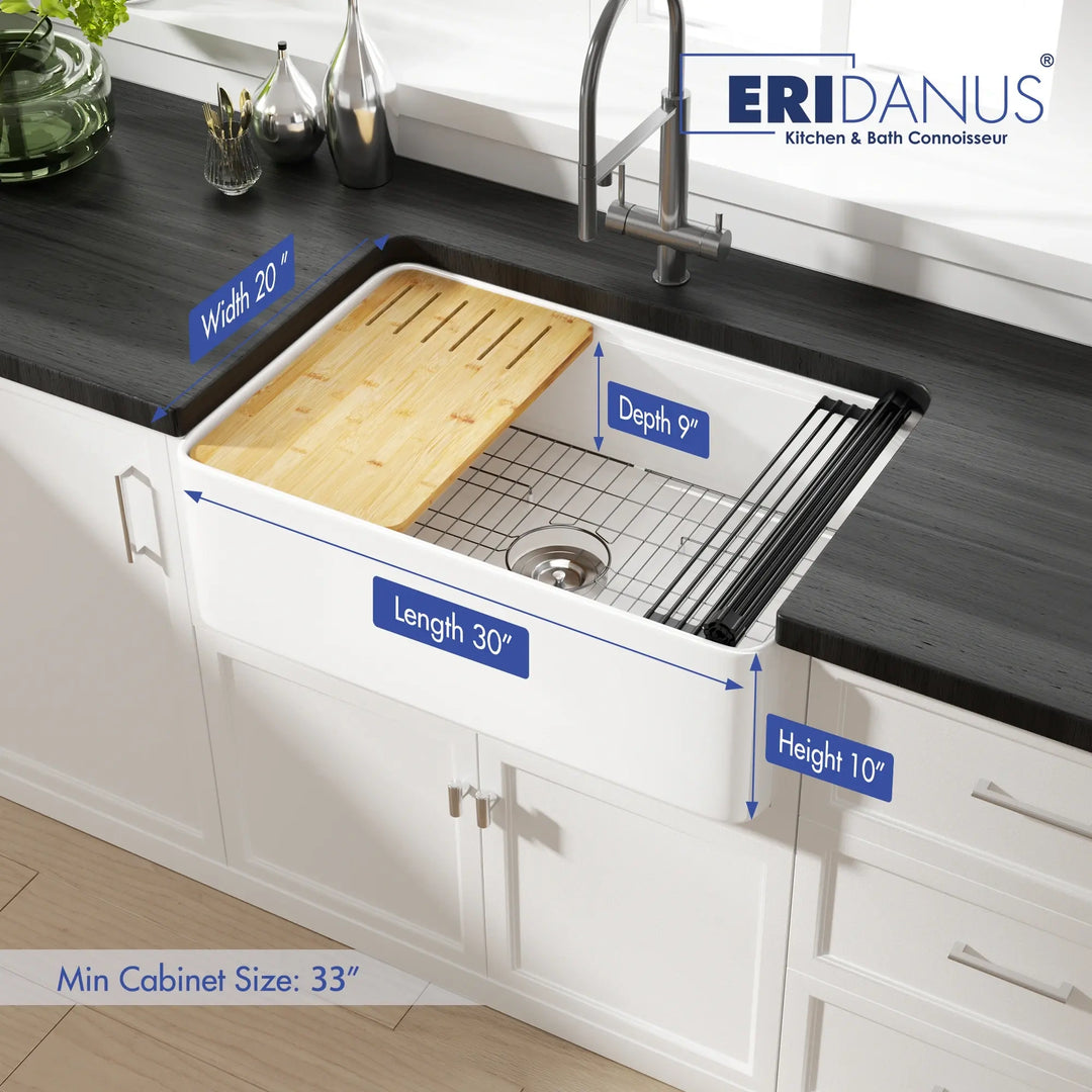 30-inch white farmhouse fireclay kitchen sink marked with dimension labels, paired with bamboo board and steel grids