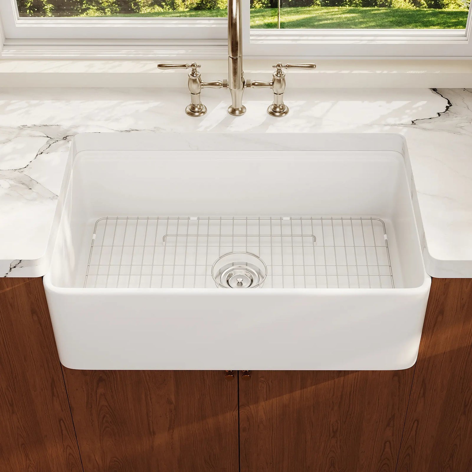 White fireclay double bowl farmhouse sink with fluted front.