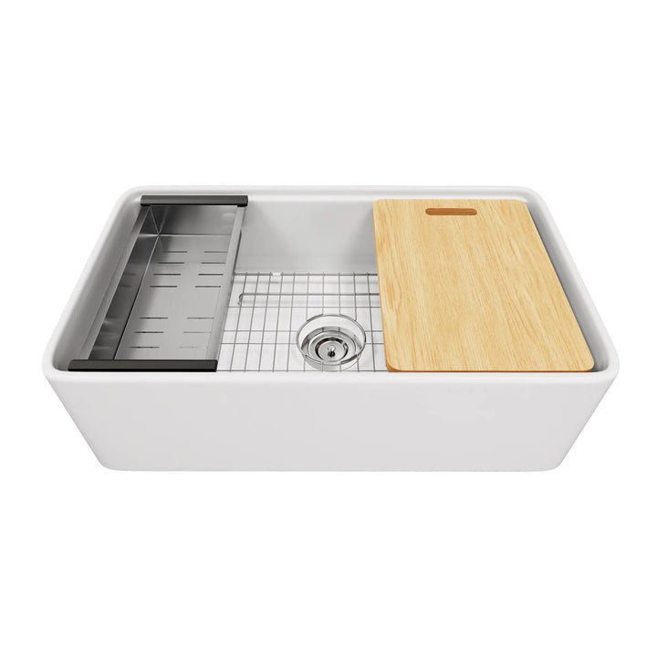 White fireclay workstation sink with included accessories