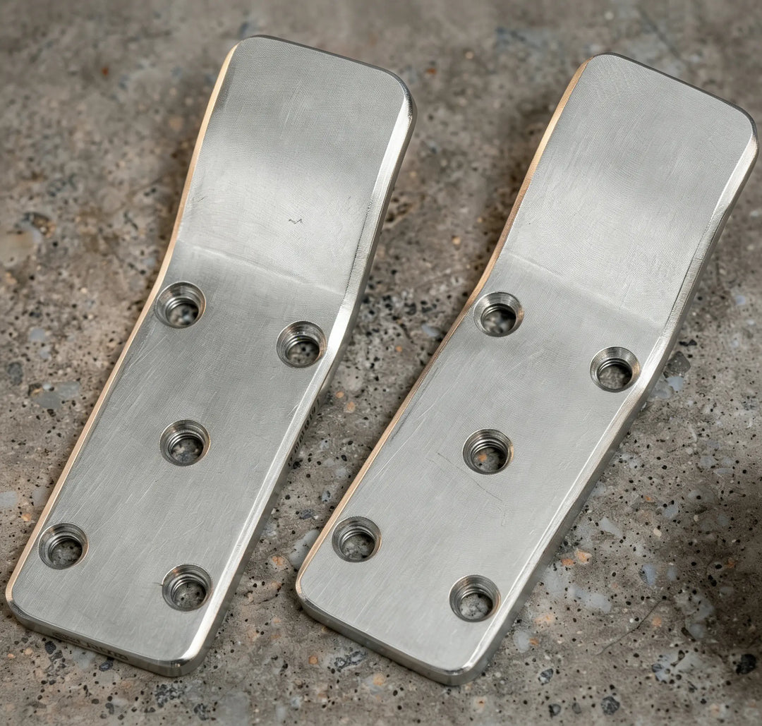 Stainless steel mounting brackets with predrilled holes for sink installation