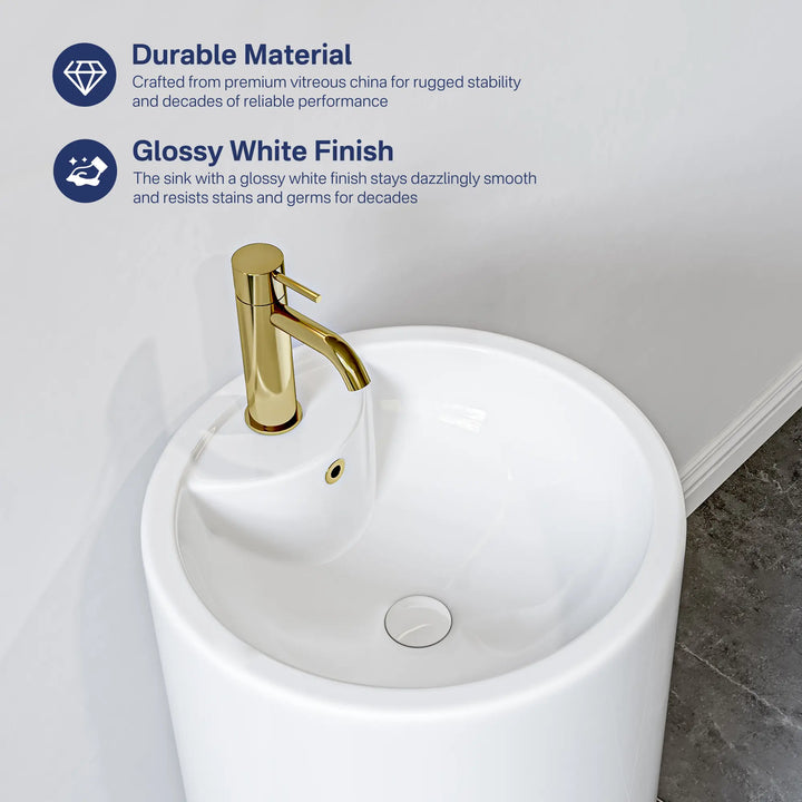 White pedestal sink with gold faucet and glossy finish