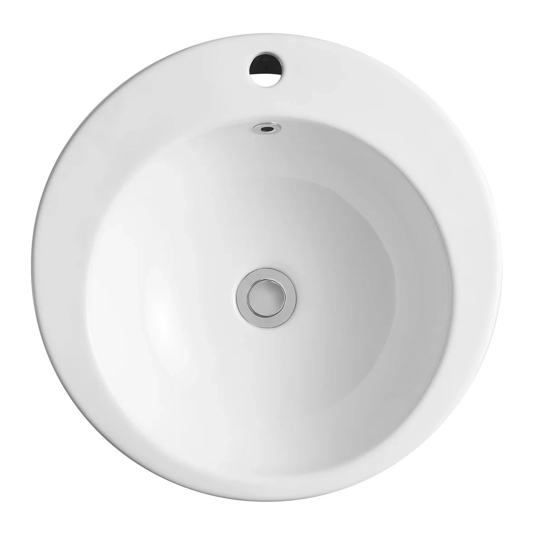 White round ceramic sink with overflow and center drain