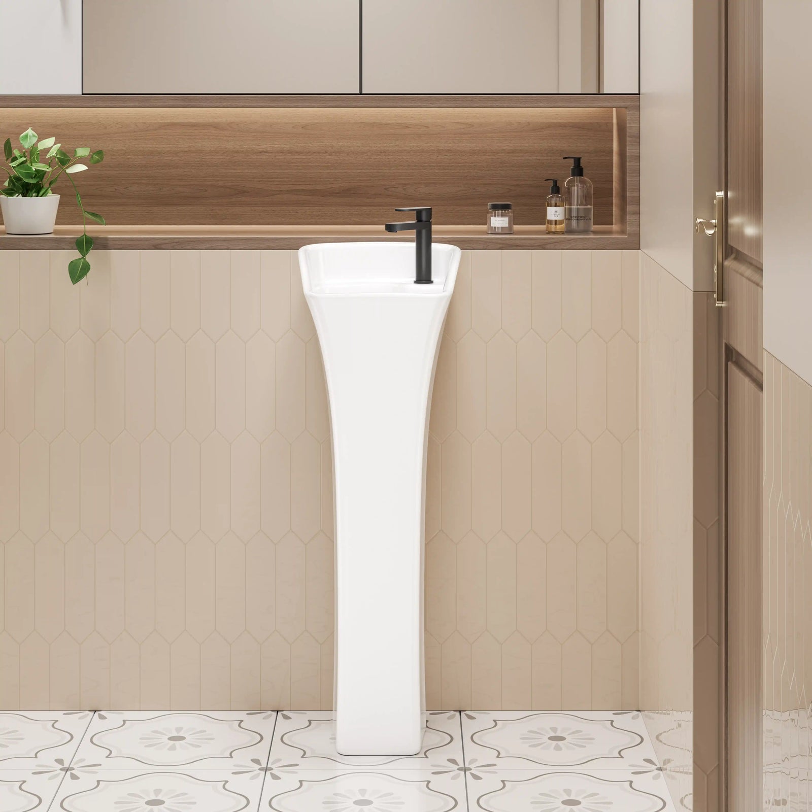 White freestanding pedestal sink with matte black faucet