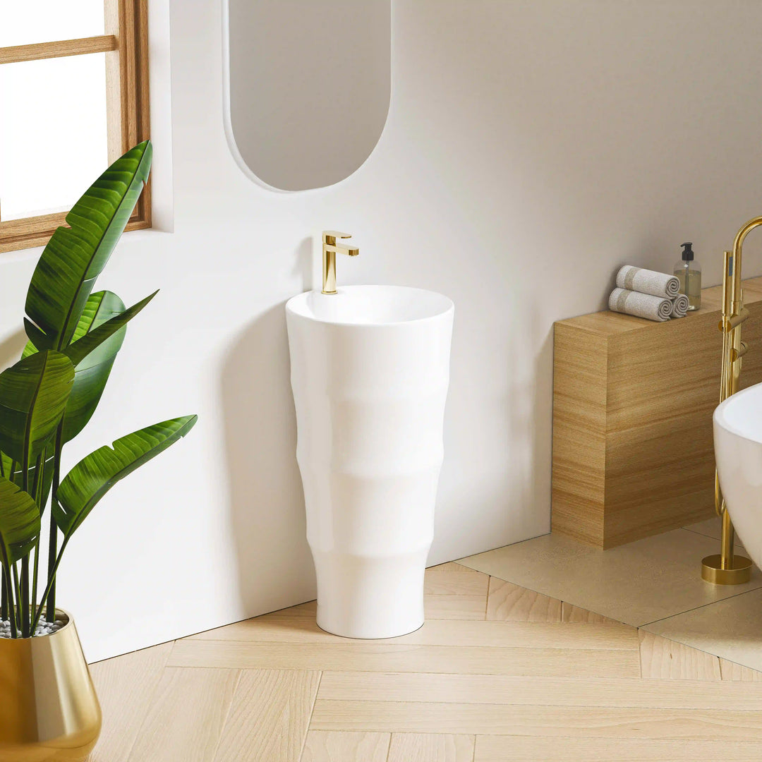 White solid surface bamboo segmented freestanding sink with brushed gold faucet