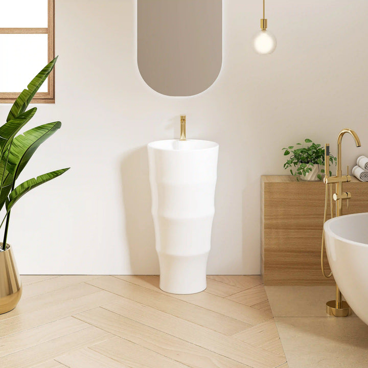 White solid surface bamboo shaped freestanding pedestal sink with gold tall faucet