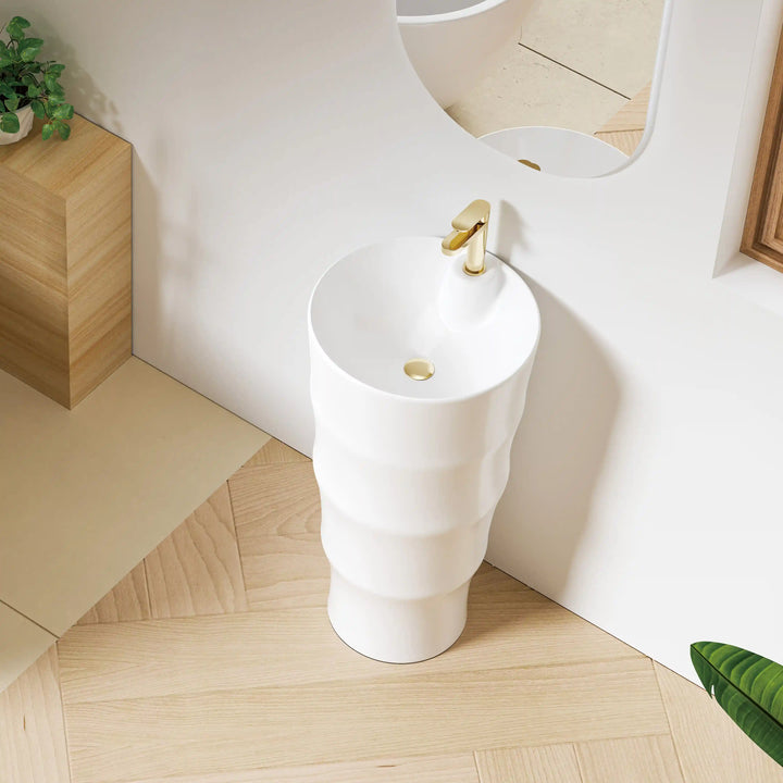 White integrated bamboo shape freestanding basin with matching gold faucet and drain