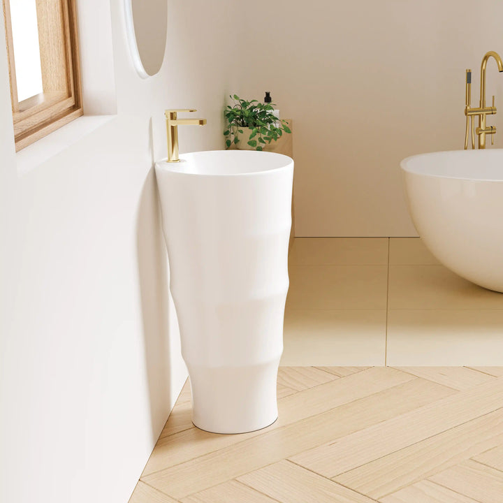 White solid surface bamboo textured freestanding pedestal sink with polished gold faucet