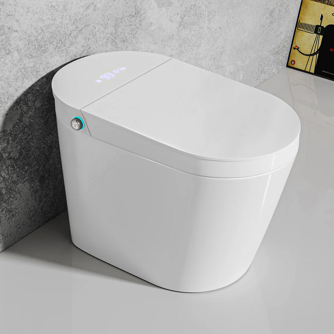 White one-piece smart toilet with digital display and side control button, modern bathroom fixture.