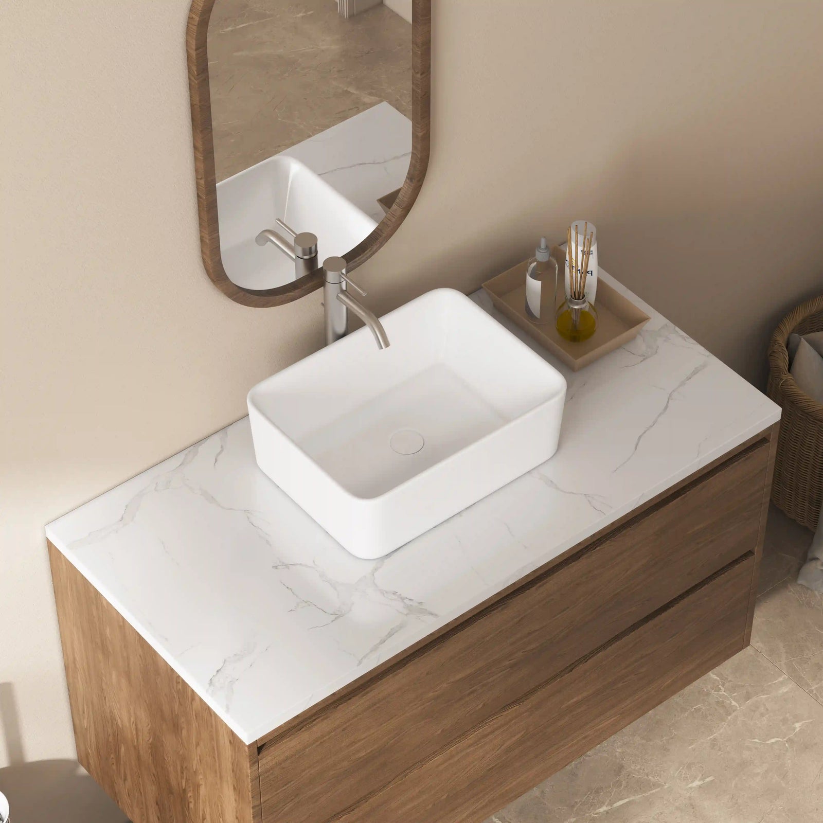 White rectangular ceramic vessel sink with brushed nickel faucet, modern bathroom vanity basin.