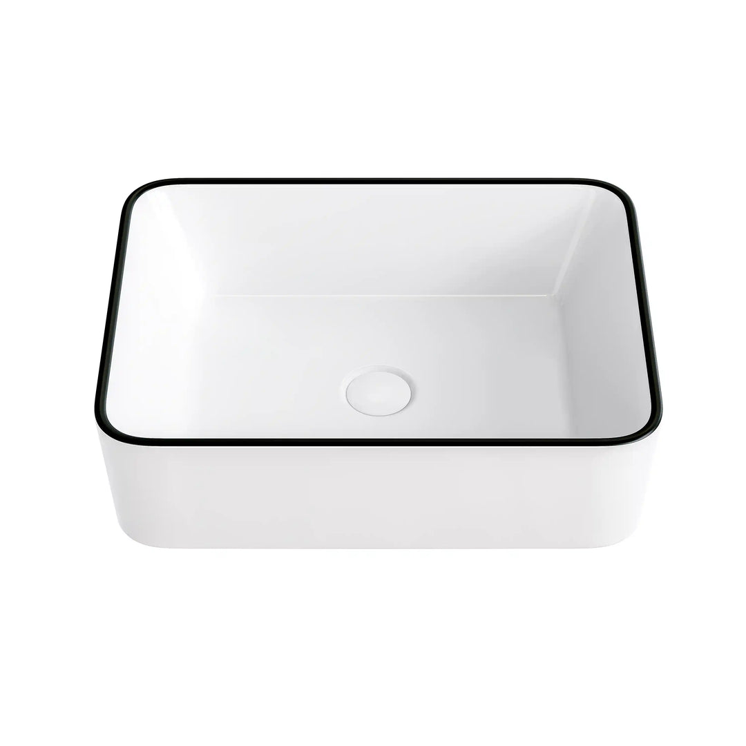 White rectangular ceramic countertop sink with thin black edge