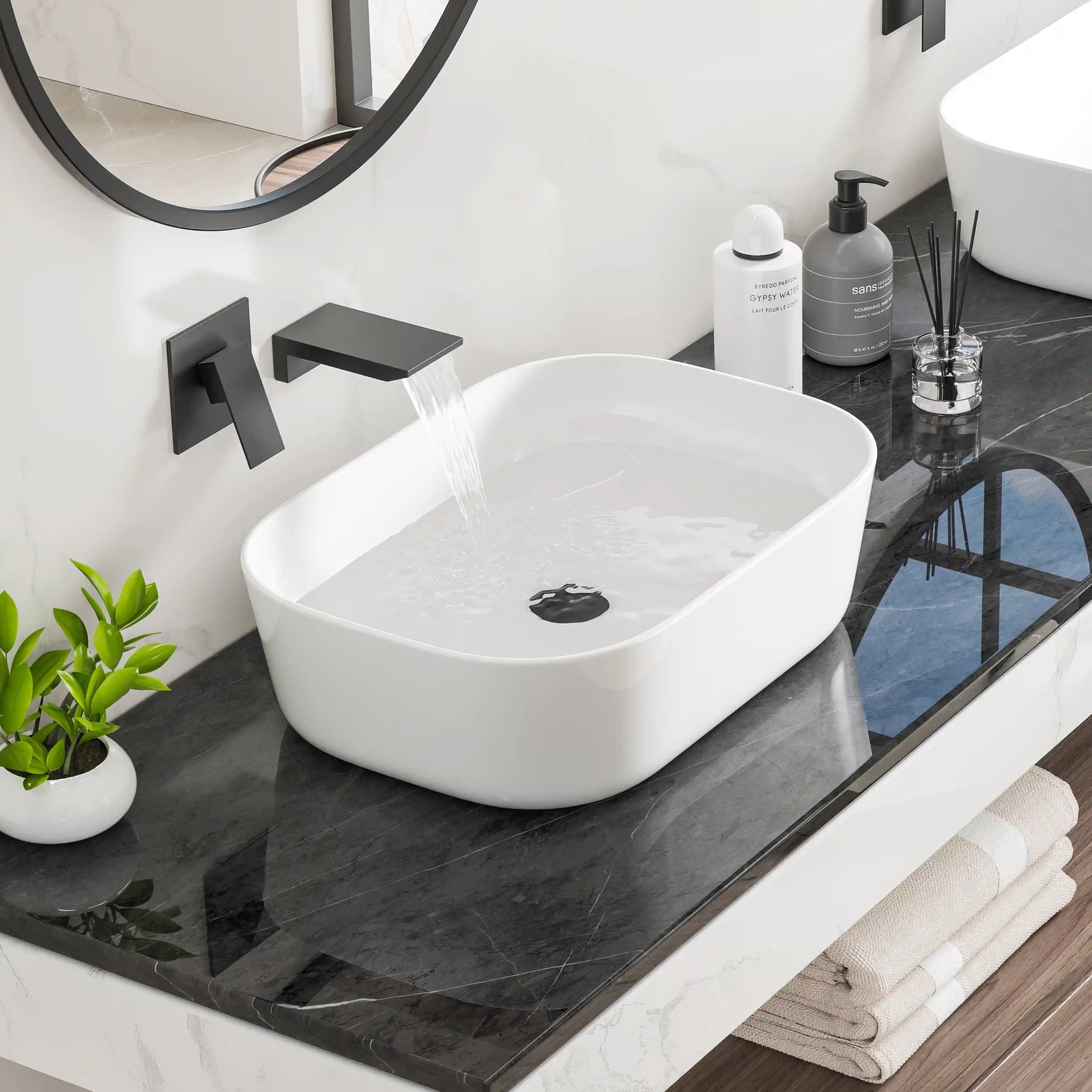 White oval ceramic vessel sink with smooth finish and water flow.#color_white