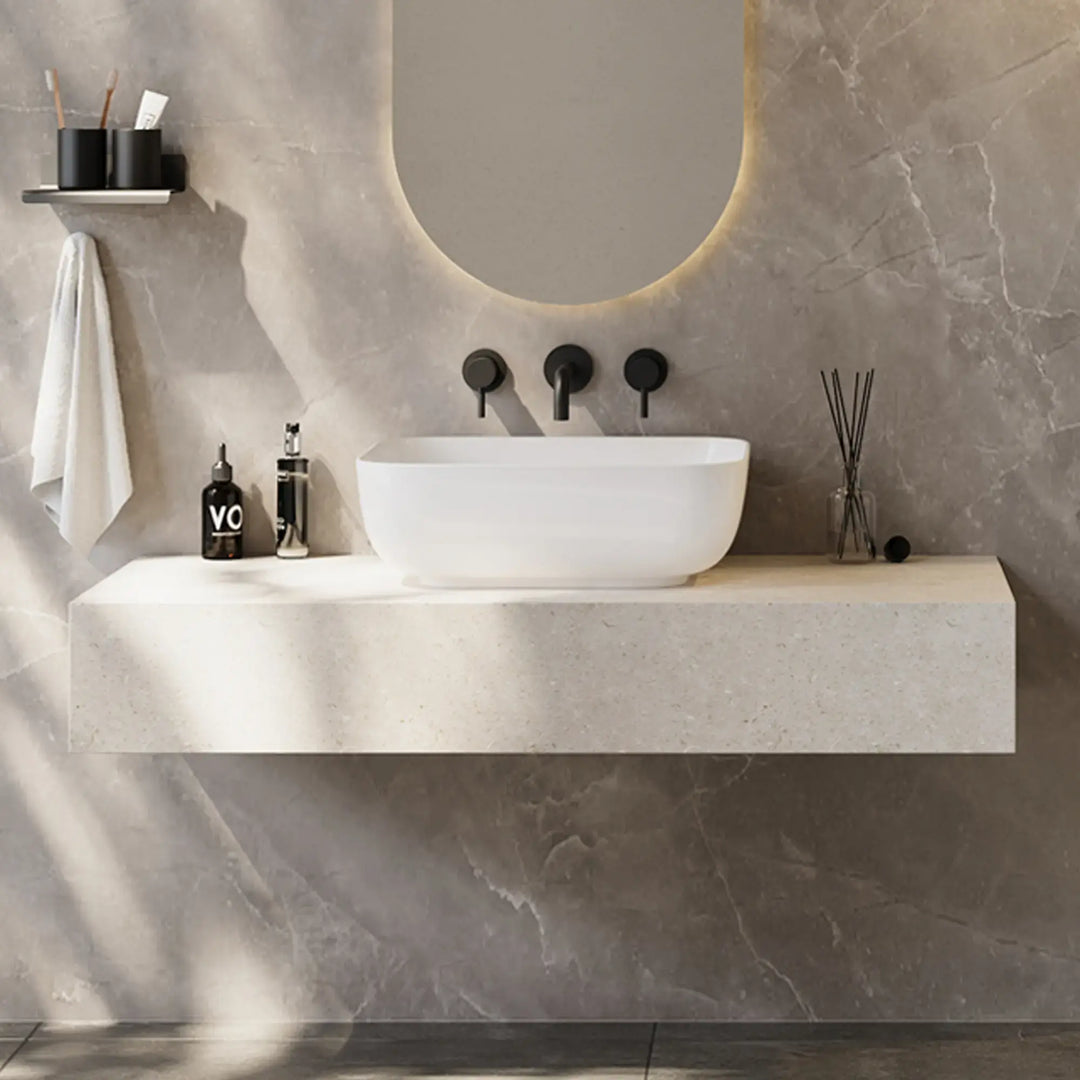 Matte white solid surface rectangular freestanding vessel sink with matte black wall-mounted three-hole faucet set