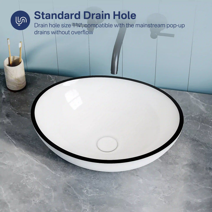 White ceramic oval vessel sink with thin black edge, standard 1 3/4 inch drain hole