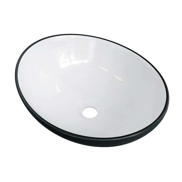 White oval ceramic vessel sink with matte black rim