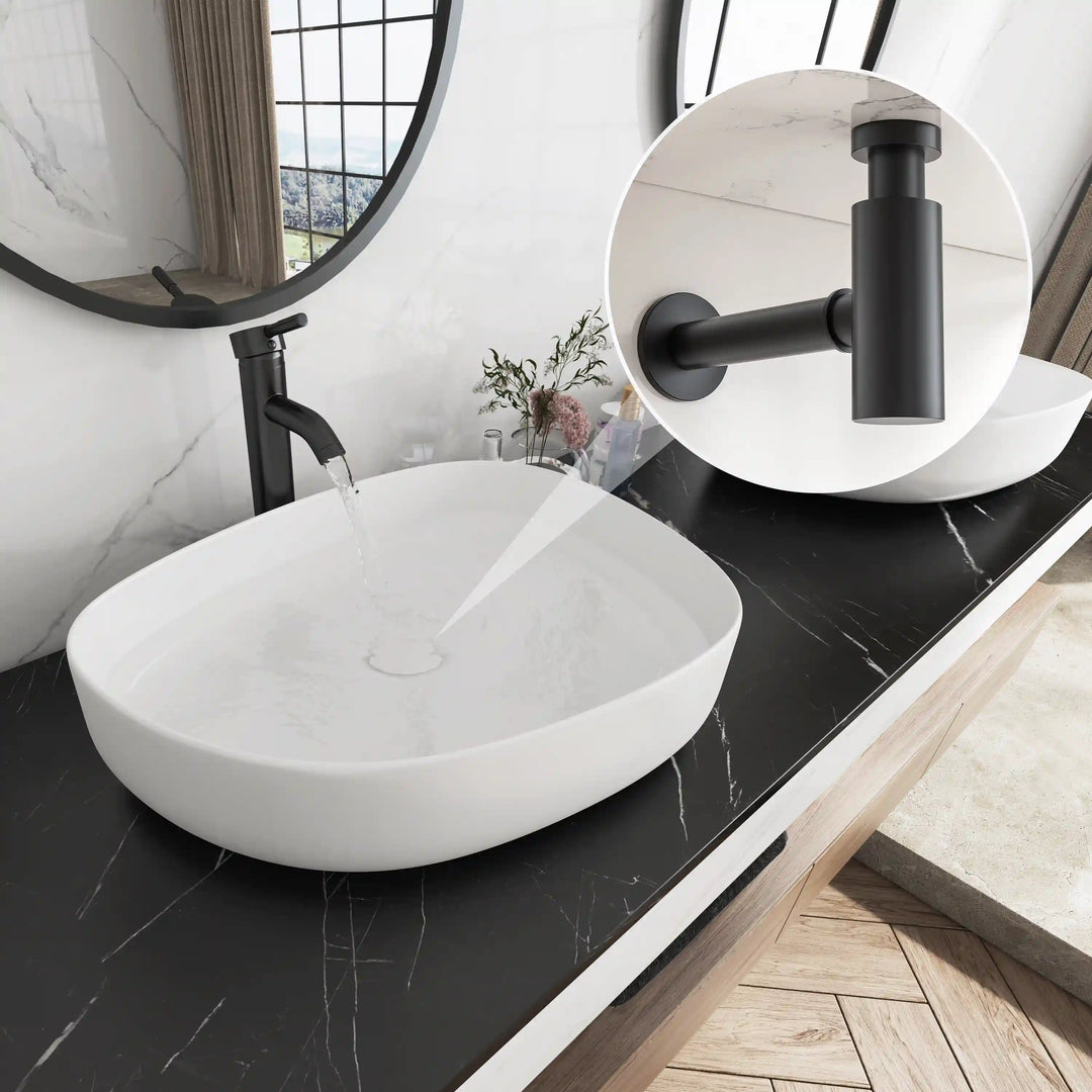 Matte black wall mounted bathroom spout with white oval ceramic vessel sink