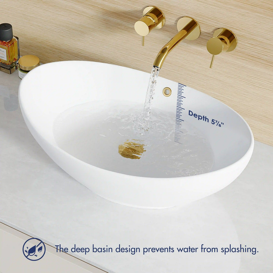 White oval ceramic vessel sink with deep anti-splash basin and gold wall faucet