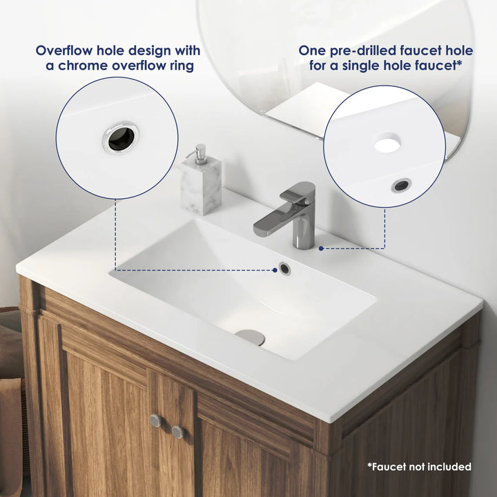 White ceramic sink with chrome overflow and faucet hole