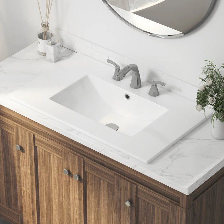 White ceramic rectangular drop-in sink with 3 holes