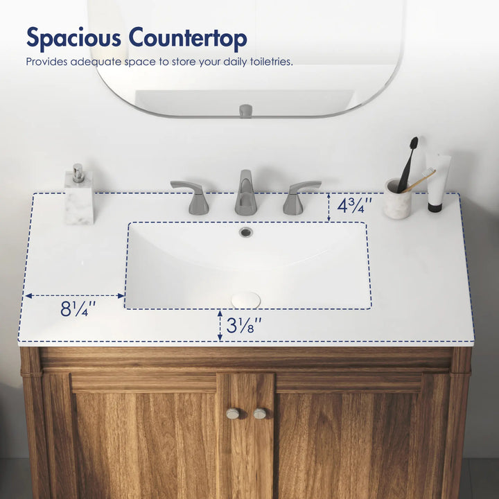White ceramic sink with spacious countertop and integrated overflow