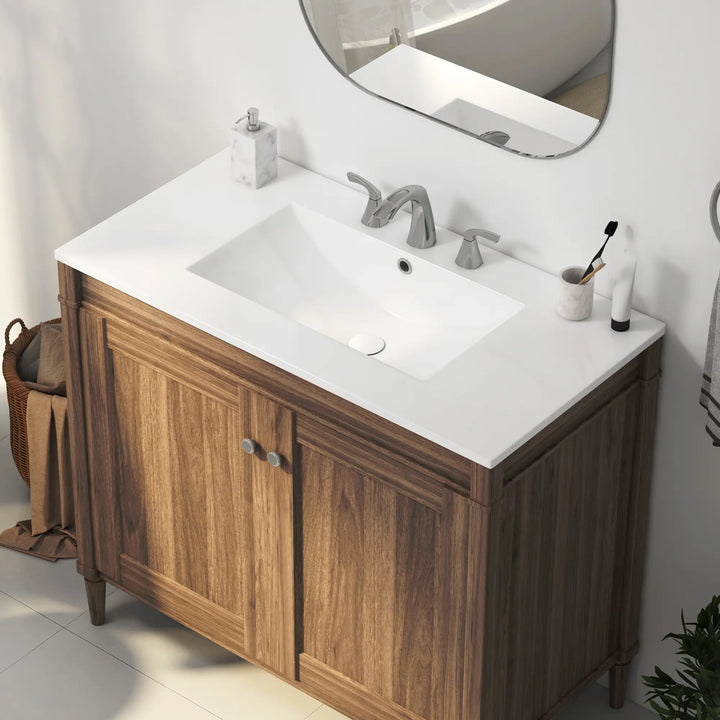 White rectangular ceramic sink with overflow and 3-hole faucet setup