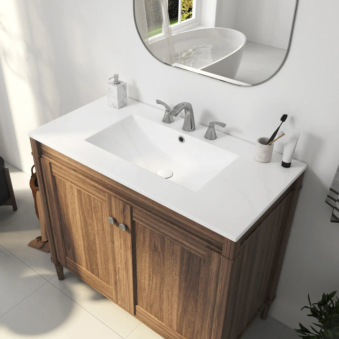 White rectangular ceramic sink with overflow and 3-hole faucet setup