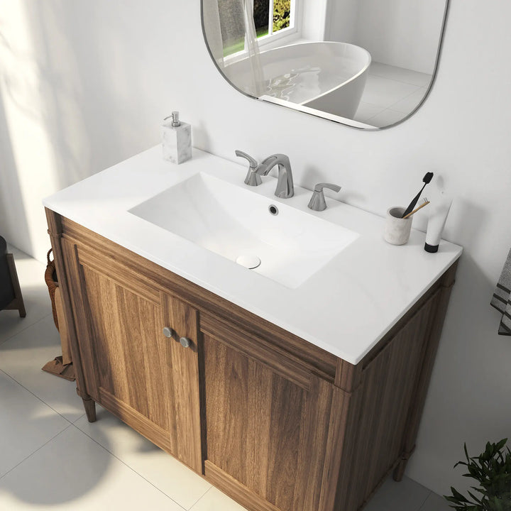 White rectangular ceramic sink with overflow and 3-hole faucet setup