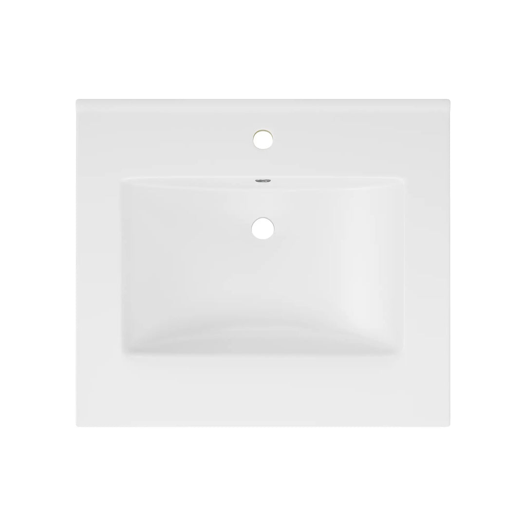 Top view of white rectangular vanity sink with single faucet hole.