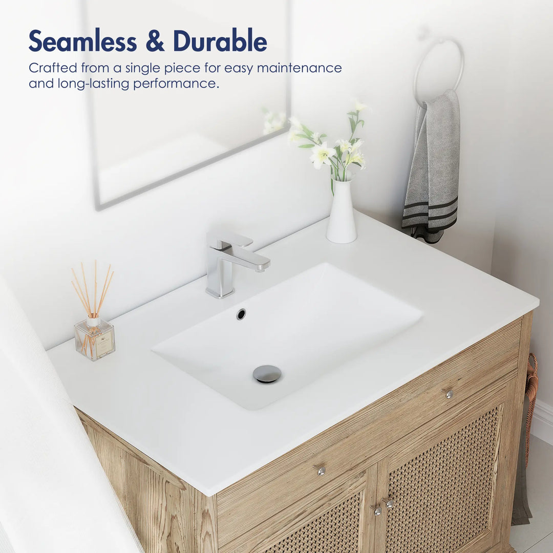 Seamless white one-piece integrated bathroom sink.