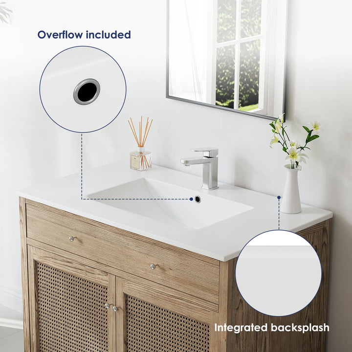 White sink with overflow and integrated backsplash.