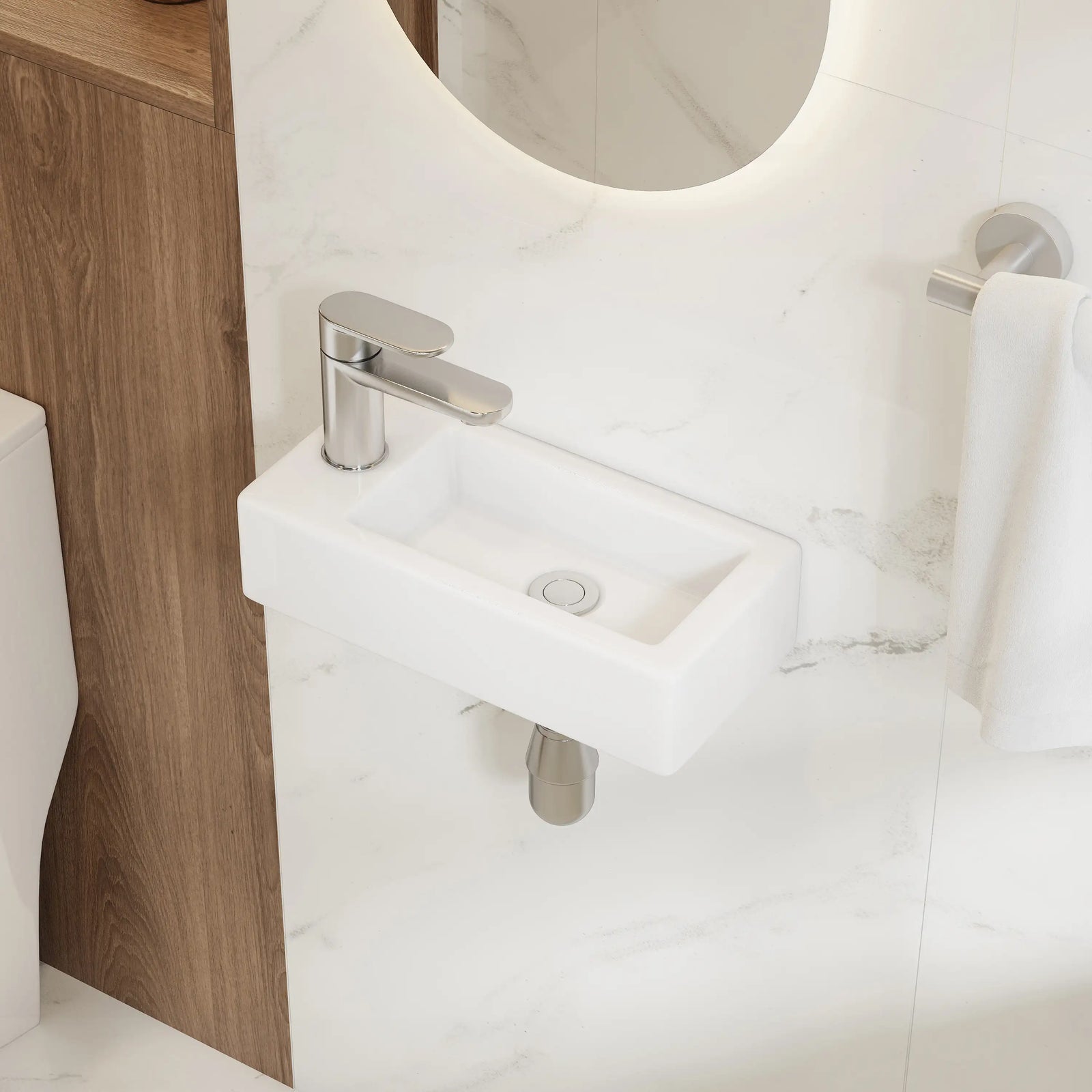 Wall-mounted rectangular white ceramic mini sink with chrome faucet.#installation-type_left-hand