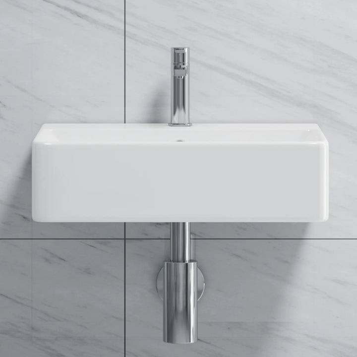 White rectangular wall-mount sink with chrome faucet.