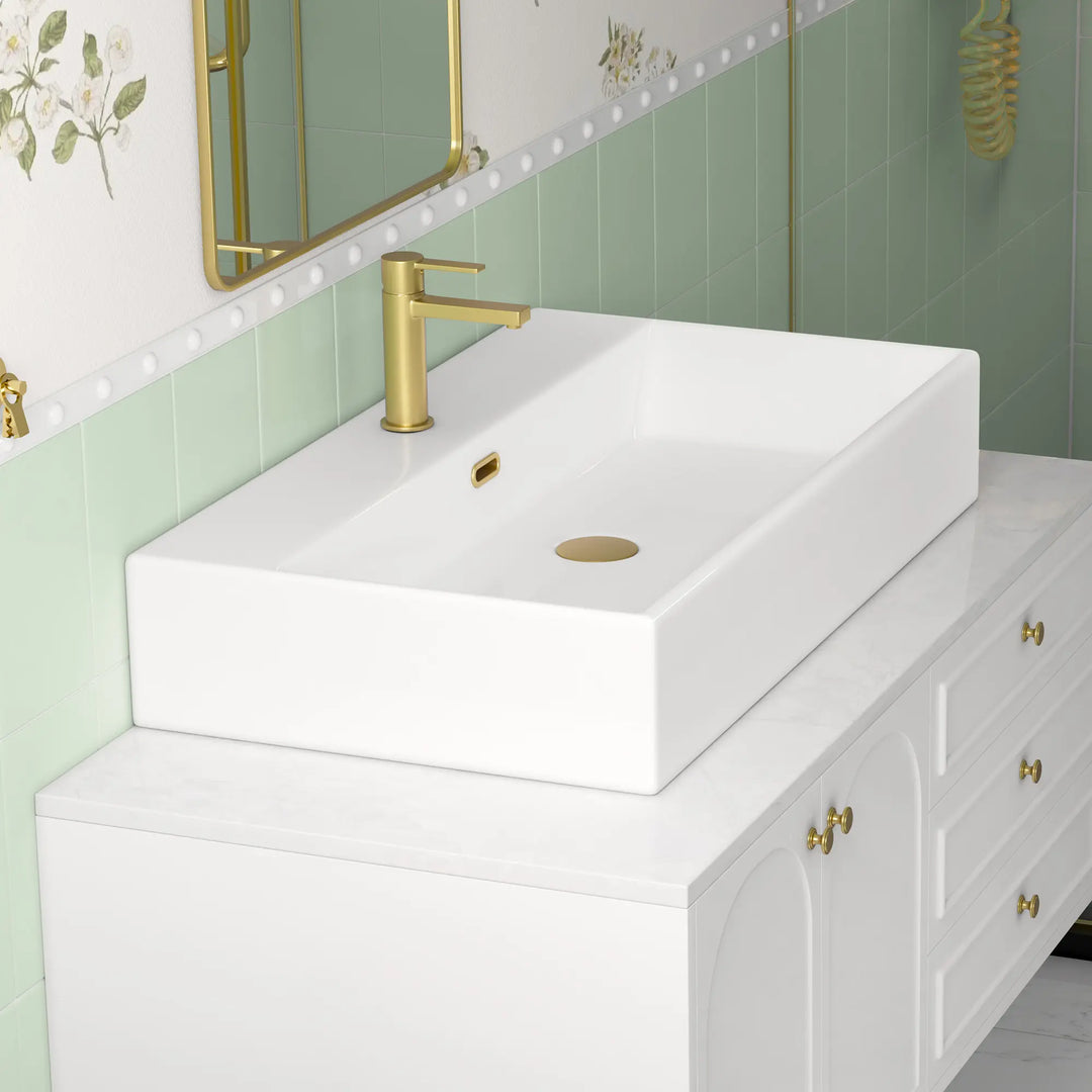 White ceramic single-hole sink with dimension markings.