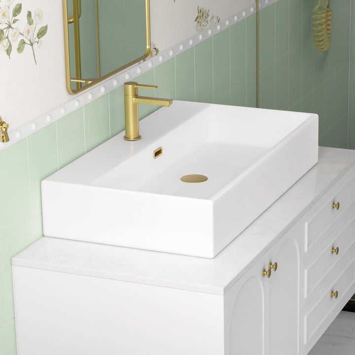 White ceramic single-hole sink with dimension markings.