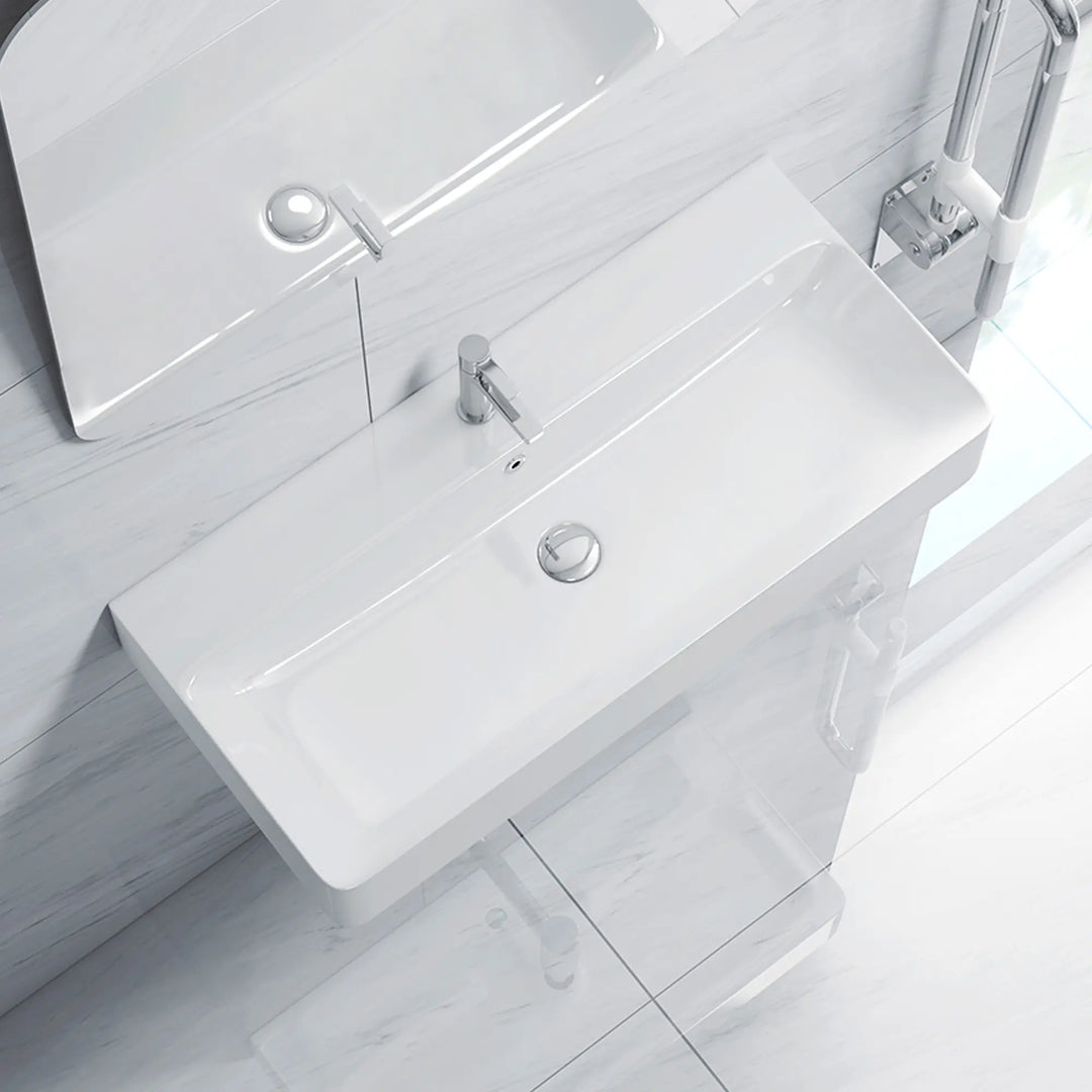 White wall-mounted ceramic sink with chrome faucet and drain