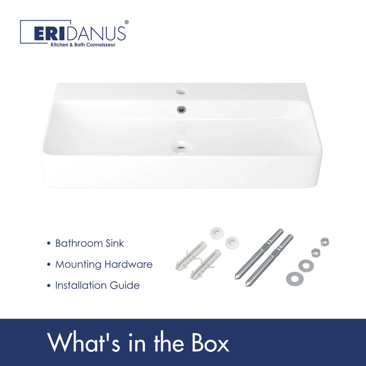 White ceramic bathroom sink with mounting hardware and installation kit