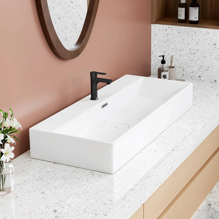 White rectangular ceramic vanity top with single faucet hole